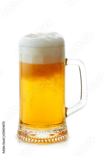 Mug of beer with foam on white