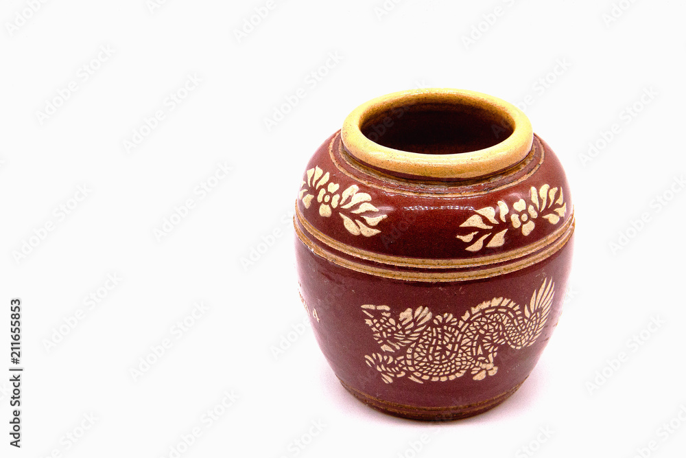 Closeup old brown jar on white background Closeup old brown jar on white background