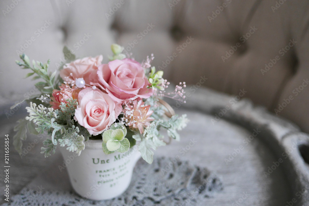 Naklejka premium Aranżacja kwiatów wzrosła