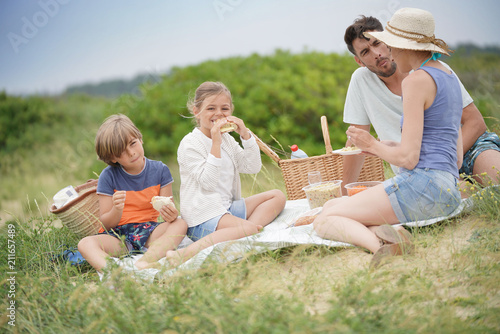 Family having a picnic in countryside