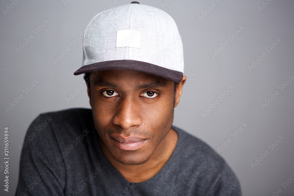 serious african american man with hat serious african american man with hat