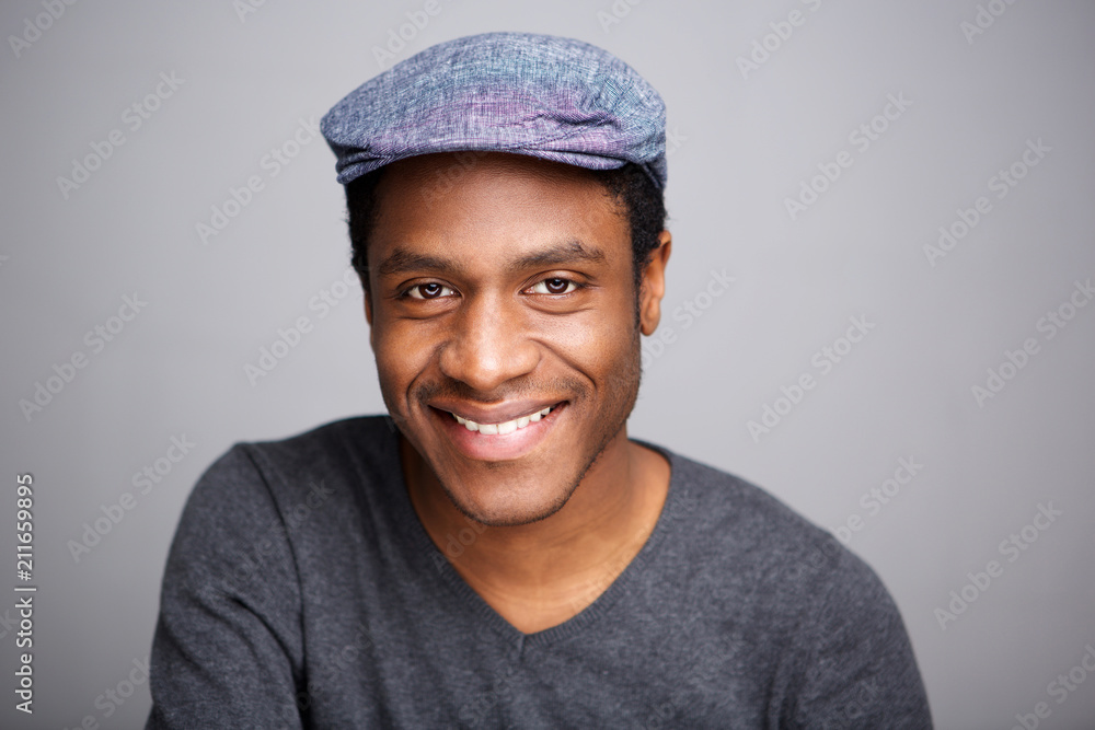 Close up smiling african american man with cap Close up smiling african american man with cap