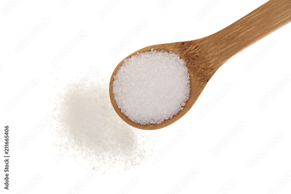 granulated sugar in wooden spoon isolated on white background. Top view. Flat lay granulated sugar in wooden spoon isolated on white background. Top view. Flat lay