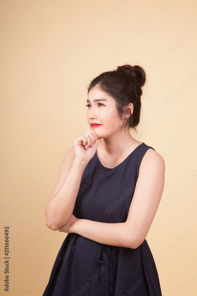 Serious young Asian woman look away. Serious young Asian woman look away.