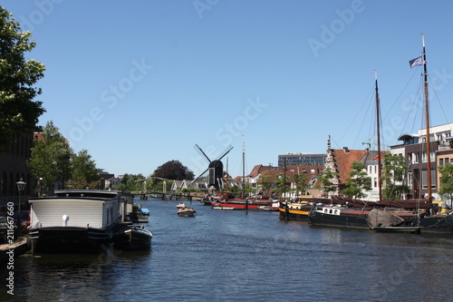 Summer vieuw of the Galgewater in Leiden, the Netherlands. Water recreation in Dutch city.  photo