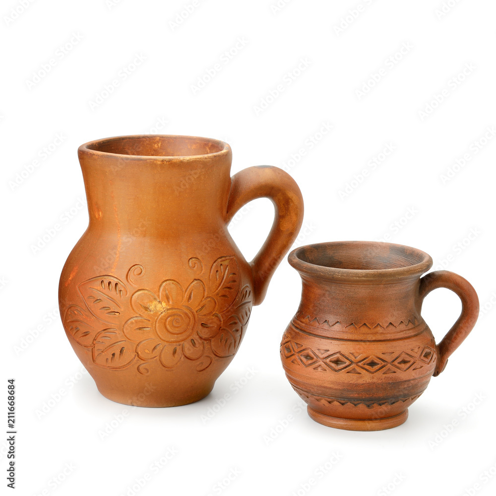 Set of old ceramic pot and mug isolated on white background.