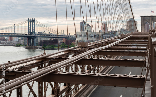 New York City / USA - JUN 20 2018: Brooklyn Bridge with Manhattan Bridge with buildings of DUMBO at early morning in New York City | JUN 20, 2018 | EDI CHEN