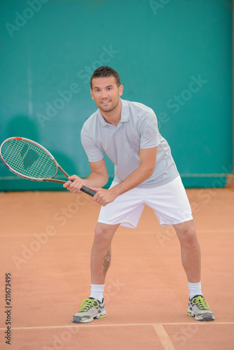 tennis player preparing to play © auremar