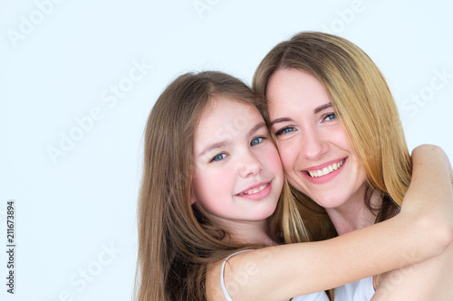 loving parent and child relationship. togetherness closeness and family unity concept. mother and daughter hugging