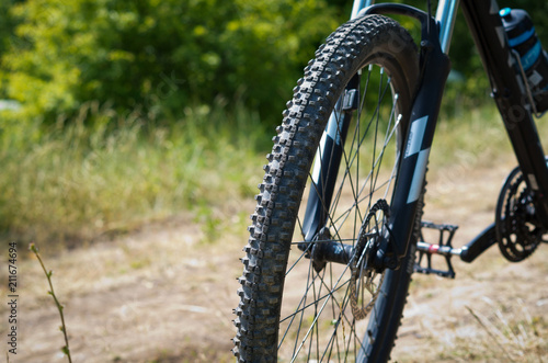 Mountain bike wheel on nature background.