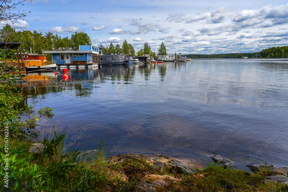 Small boats moored on Saimaa lake.Imatra town.