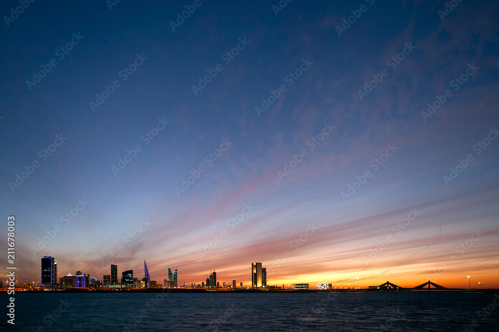 A beautiful view of Bahrain skyline during evening hours at sunset