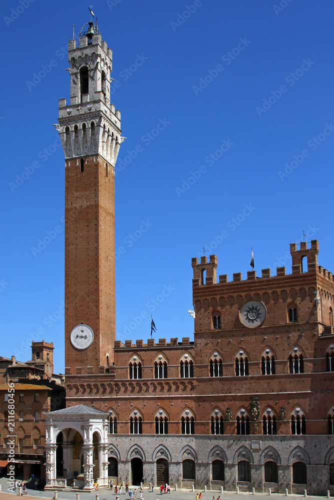 The Torre del Mangia and the Palazzo Publico in The Campo, Siena, Tuscany, Italy