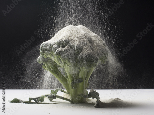 Broccoli concept with flour photo