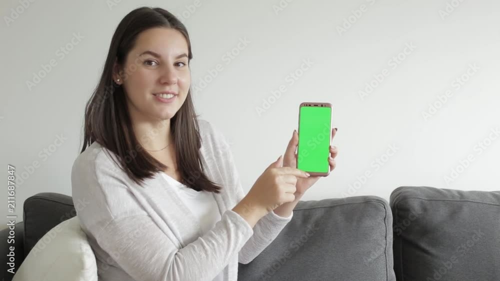 Female demonstrating android app. Green screen chroma key Female demonstrating android app. Green screen chroma key