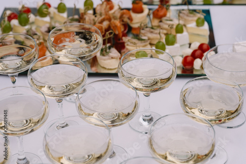 Glasses with champagne on a holiday table