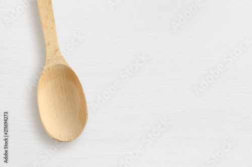 Wooden spoon on white table