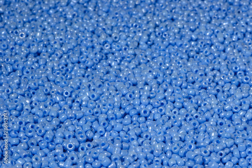 scattered beads of blue color.