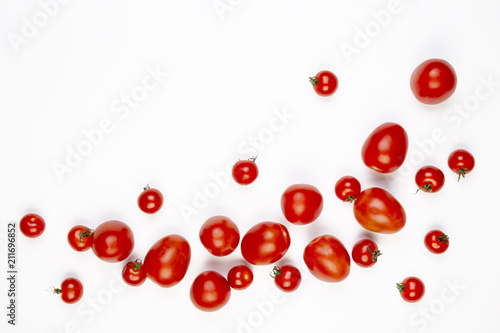 Tomatoes isolated on white background. A frame, a free place for an inscription.