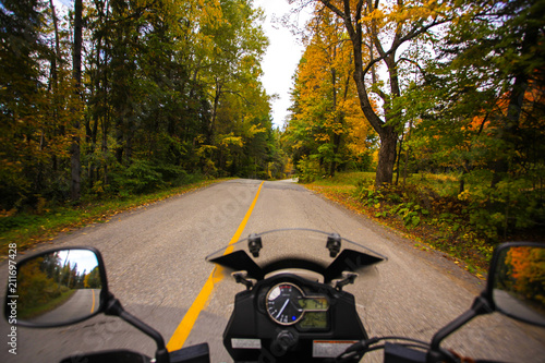 Driving Motorcycle on forest montait twisties road