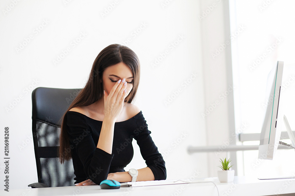 Pain. Health healthcare care concep. Portrait of sad upset accountant holding hand on head suffering from syndrome symptom head ache feeling bad sitting at desktop. Health healthcare care concept Pain. Health healthcare care concep. Portrait of sad upset accountant holding hand on head suffering from syndrome symptom head ache feeling bad sitting at desktop. Health healthcare care concept