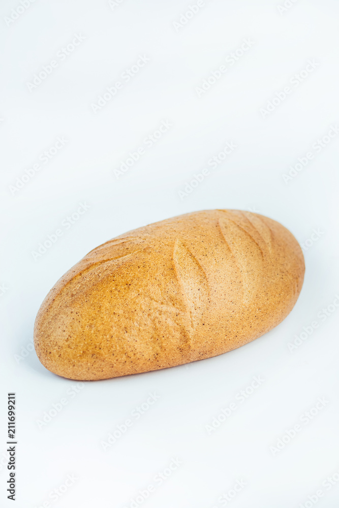 Large loaf of bread isolated on white background