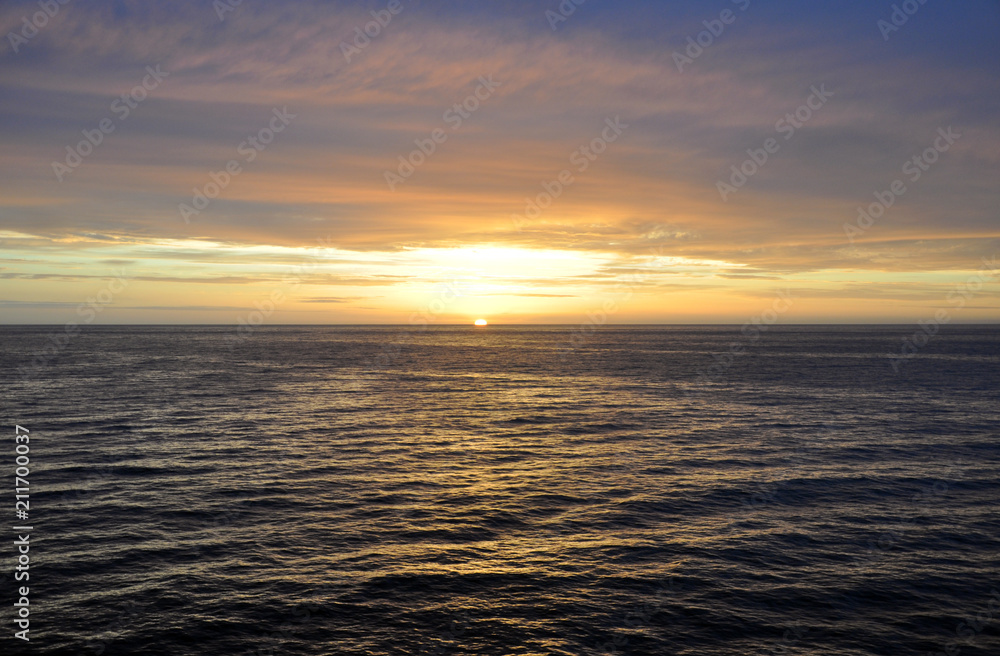 sunset in the North sea off the coast of Iceland from the cruise ship