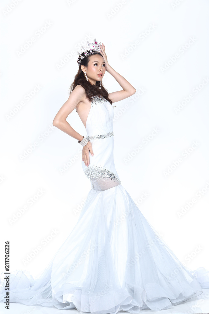 Fototapeta premium Miss Pageant Contest in Evening Ball Gown long ball dress with Diamond Crown, fashion make up hair style