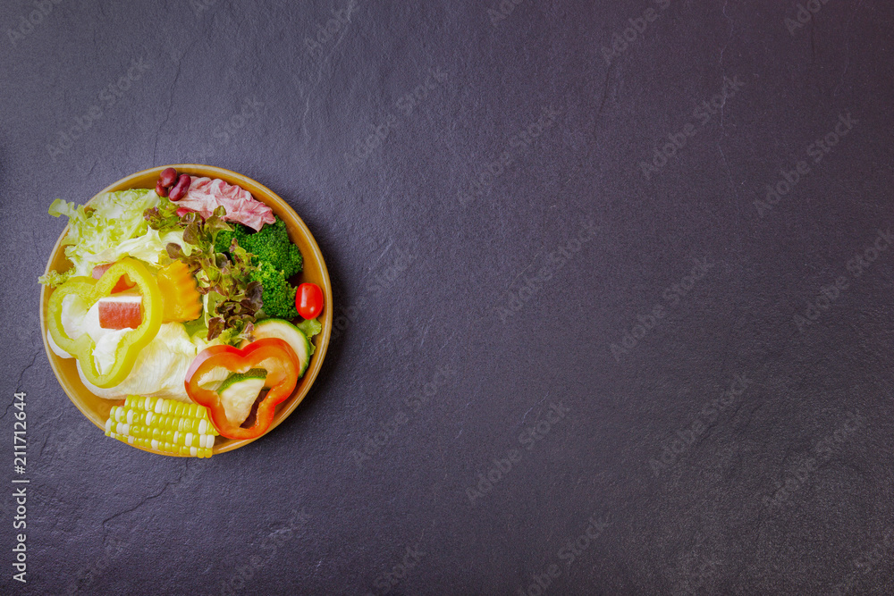 salad healthy food on black stone background. Weight loss. Copy space. salad healthy food on black stone background. Weight loss. Copy space.