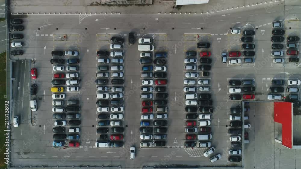 Abstract overhead aerial shot of parking lot of modern shopping mall in Zagreb, Croatia Abstract overhead aerial shot of parking lot of modern shopping mall in Zagreb, Croatia