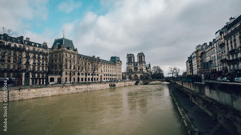 Cathedral de Notre Dame on the bank of the flooded River Seine, Paris, France