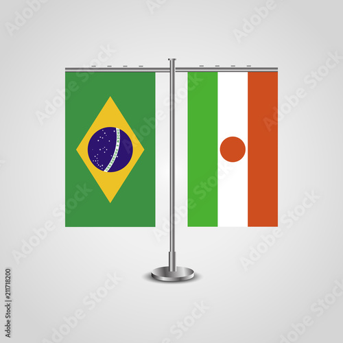 Table stand with flags of Brazil and Niger.Two flag. Flag pole. Symbolizing the cooperation between the two countries. Table flags photo