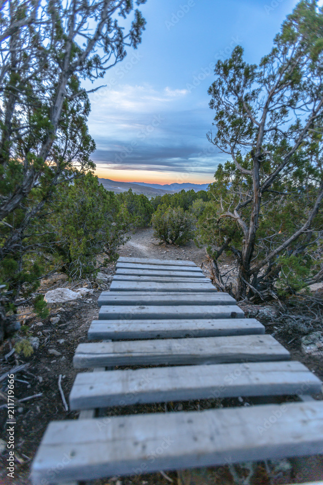 Wooden structure at sunset on trail