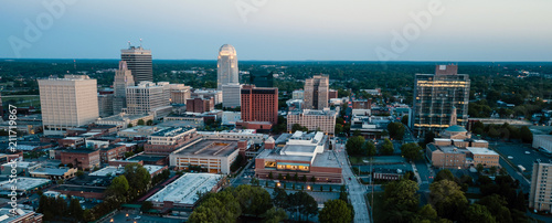 Aerial View as Night Falls on the Downtown City Skyline at Winston-Salem