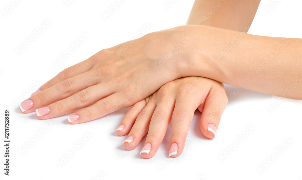 Naklejka premium Female hand french manicure on white background isolation