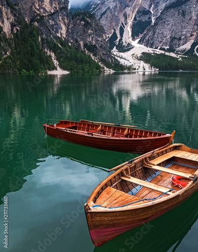 Wooden boats on the beautiful lake Braies,