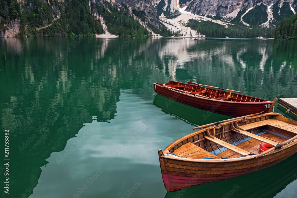 Wooden boats on the beautiful lake Braies,