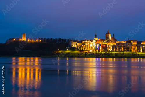A view of Grudziadz at night reflected in Vistula river  Poland. Europe.