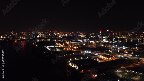 Aerial bird s eye view photo taken by drone of famous Canary Wharf skyscraper complex  Isle of Dogs  London  United Kingdom