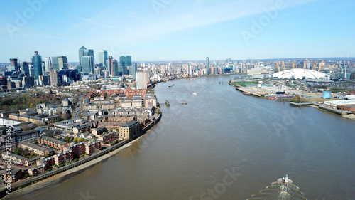 Aerial bird s eye view photo taken by drone of famous Docklands and Canary Wharf skyscraper complex  Isle of Dogs  London  United Kingdom