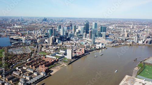 Aerial bird's eye view photo taken by drone of famous Docklands and Canary Wharf skyscraper complex, Isle of Dogs, London, United Kingdom © aerial-drone
