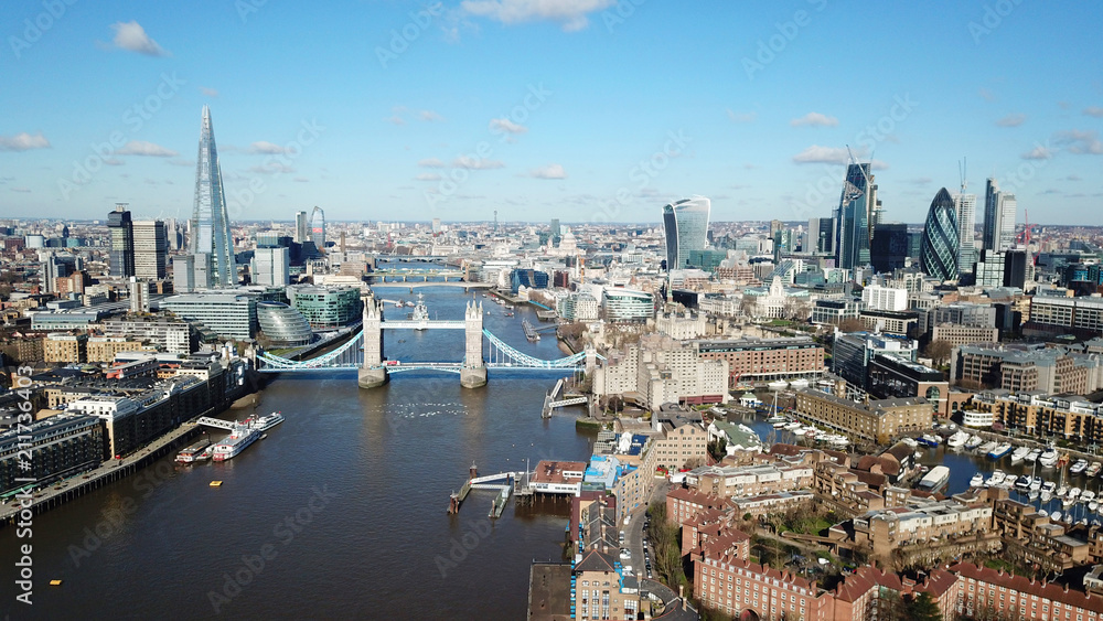 Naklejka premium Aerial drone bird's eye view of iconic Tower Bridge, the Shard and skyline in City of London, United Kingdom