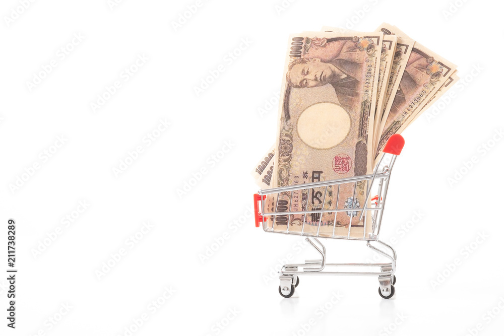 Japanese Yen, JPY in small shopping trolley on white background. Finance concept.