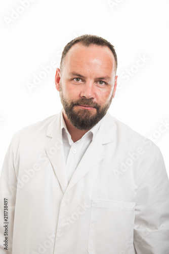Portrait of male doctor posing wearing white robe