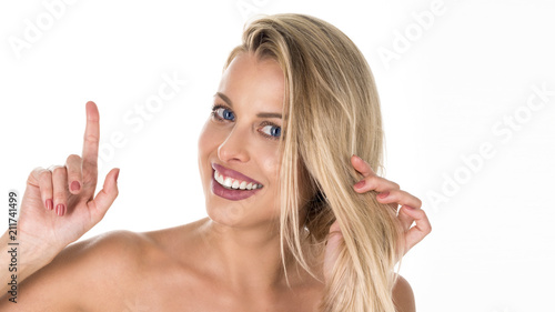 Wallpaper Mural Photo of energetic nice smiling lady wearing grey top isolated on white background pointing her finger in eureka sign, having great innovative idea, understanding or solution she has just got Torontodigital.ca