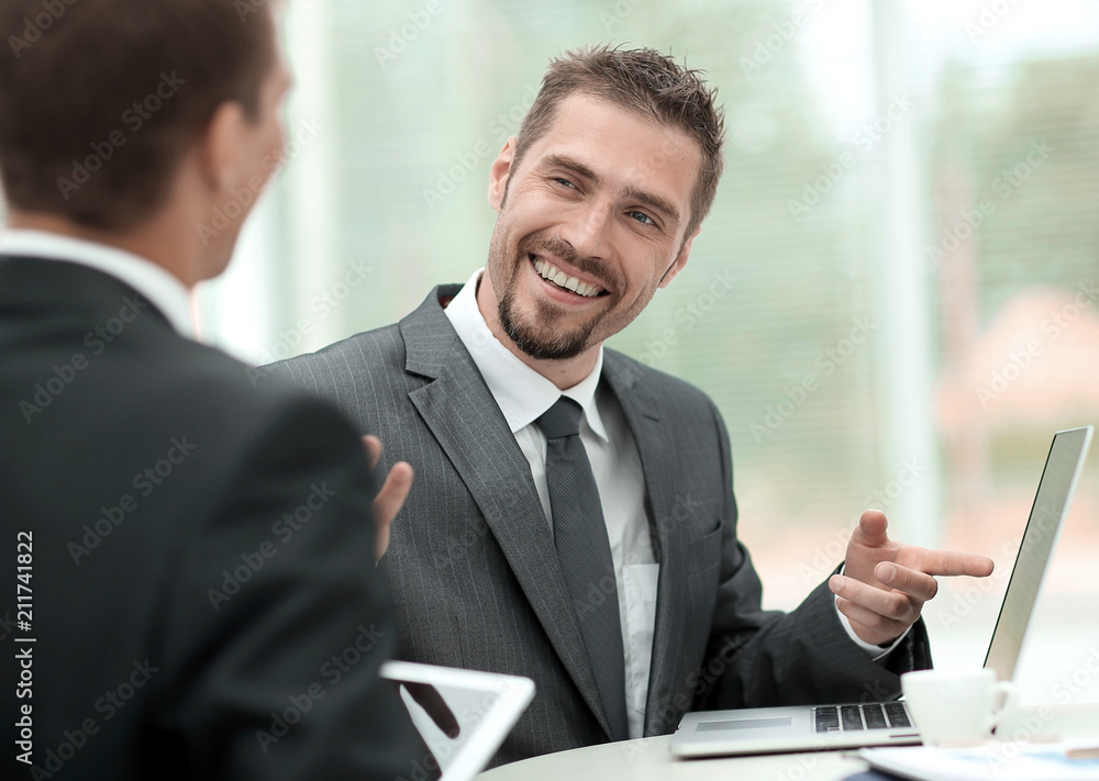 closeup.business partners discussing business issues closeup.business partners discussing business issues