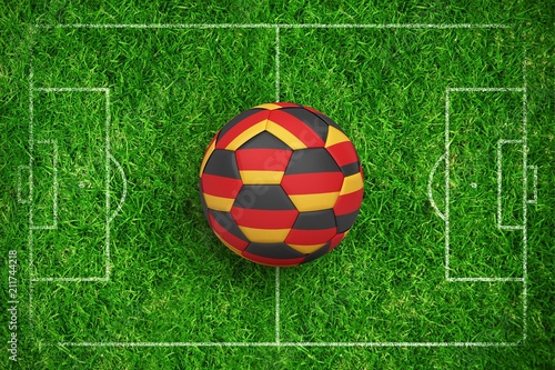 Composite image of football in german colours