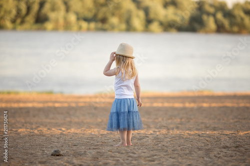 little girl on the sandy beach