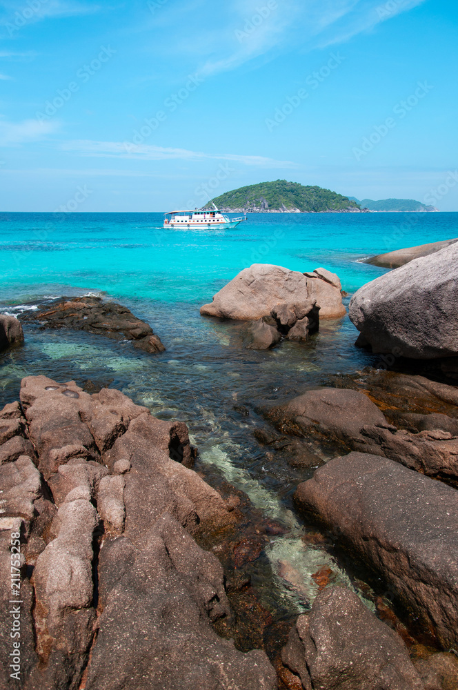 Similan island and vibrant turquoise blue Andaman sea. Phang Nga - Phuket, Thailand