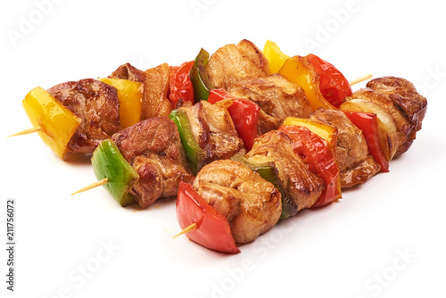 Tableau sur toile Skewers with pieces of grilled barbecue, red, yellow and green bell pepper, seasoned with coarse salt and olive oil, isolated on white background